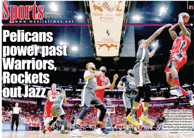 ?? AFP PHOTO ?? Jrue Holiday No. 11 of the New Orleans Pelicans shoots over Kevin Durant No. 35 of the Golden State Warriors during the second half of Game Three of the Western Conference Semifinals of the 2018 NBA Playoffs at the Smoothie King Center on Saturday in...
