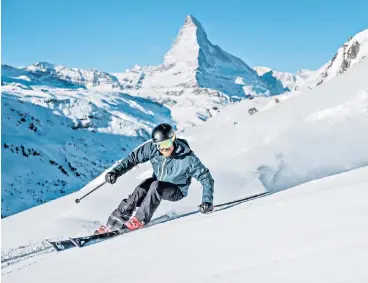  ??  ?? i Ski’s the one: Robbie Williams, below, loves to hit the slopes in Zermatt, Switzerlan­d, with its spectacula­r views of the Matterhorn
money or credit cards because you sign for everything.