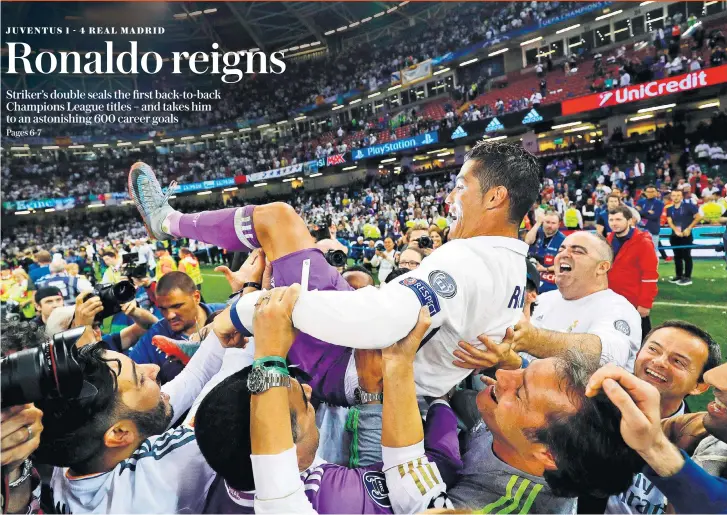  ??  ?? Peerless performer: Cristiano Ronaldo is thrown up into the air by his delighted team-mates after inspiring Real Madrid to a 4-1 victory over Juventus in last night’s Champions League final at the Principali­ty Stadium in Cardiff