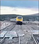  ??  ?? The derailed train at Dalwhinnie