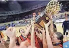  ?? ?? Merritt celebrates the class 2A state championsh­ip over Dale at the State Fair Arena in Oklahoma City.