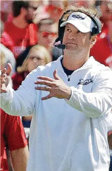  ?? [AP PHOTO] ?? RIGHT: Lane Kiffin went 11-3 with a Conference USA title in his first season as Florida Atlantic’s head coach.