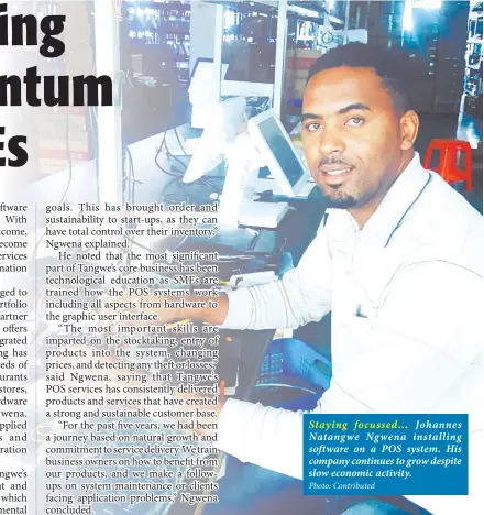  ?? Photo: Contribute­d ?? Staying focussed… Johannes Natangwe Ngwena installing software on a POS system. His company continues to grow despite slow economic activity.