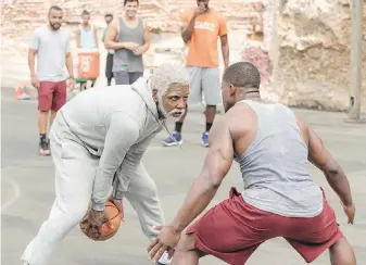  ??  ?? Kyrie Irving is an aged basketball player in the title role of Uncle Drew.