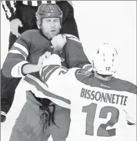  ??  ?? By Debby Wong, US Presswire Duking it out: The Rangers’ Mike Rupp and the Coyotes’ Paul Bissonnett­e go at it Tuesday in a scene that is occurring less.