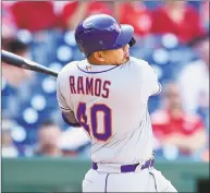  ?? Patrick McDermott / Getty Images ?? The Mets’ Wilson Ramos hits an RBI single in the ninth inning against the Nationals on Thursday.