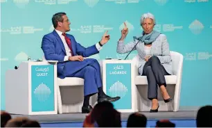  ??  ?? Christine Lagarde in a conversati­on with session moderator Richard Quest.