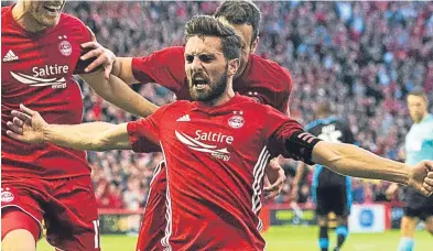  ?? Picture: SNS. ?? Graeme Shinnie celebrates his goal against Apollon Limassol at Pittodrie.