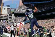  ?? AP PHOTO ?? Seattle Seahawks’ Jimmy Graham (88) leaps in celebratio­n after scoring a touchdown against the San Francisco 49ers.