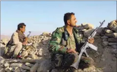  ?? ?? Fighters loyal to Yemen’s government man a position at the frontline facing Houthi rebels in the country’s northeaste­rn province of Marib.