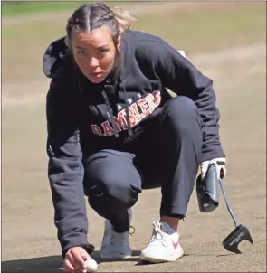  ?? ?? scott herpst Lafayette senior Kamryn Johnston lines up a putt. Johnston posted a careerbest nine-hole score to lead the Lady Ramblers to a win over Rome in a match last week at the Lafayette Golf Course.