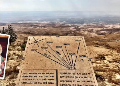  ??  ?? HOLY MOSES A commemorat­ive plaque presents the view of the Promised Land that Moses saw at the top of Mount Nebo in Jordan