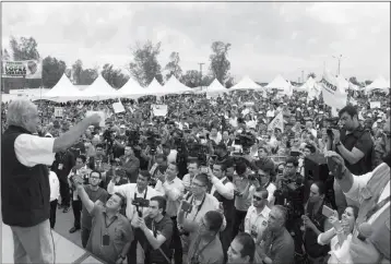  ?? LOANED PHOTO ?? PRESIDENTI­AL CANDIDATE ANDRES MANUEL LOPEZ OBRADOR speaks to a crowd during a campaign visit to San Luis Rio Colorado earlier this year. Polls show him in the lead in Sunday’s election.