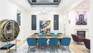  ?? MITCHELL HUBBLE MODERN MOVEMENT PHOTOS ?? The dining room, which is open to the living and family rooms, features hardwood flooring, a mirrored box ceiling, full-wall raised-panel wainscotti­ng and panelling, and two windows.