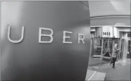  ?? [ERIC RISBERG/THE ASSOCIATED PRESS] ?? Uber suffered a new blow Wednesday as the European Union’s top court ruled that it should be regulated like a taxi company and not a technology service, a decision that could change the way it functions across the continent.