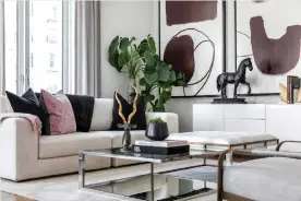  ?? (Handout/tns). ?? A “pop of pink” adds an unexpected contrast element in this living space.