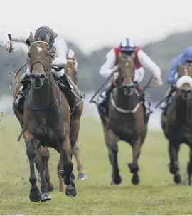  ??  ?? Jockey Luke Morris and Marsha, left, had a thrilling victory in the the big race at York yesterday, getting up to beat Lady Aurelia and