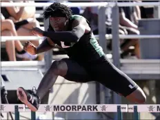  ?? ?? Upland’s Delaney Crawford wins the Division 1boys 300hurdles on Saturday.