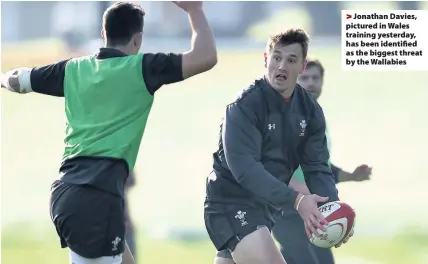  ??  ?? > Jonathan Davies, pictured in Wales training yesterday, has been identified as the biggest threat by the Wallabies