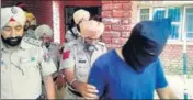  ?? HT FILE ?? Police taking a Dera Sacha Sauda follower accused of sacrilege to a Moga court.