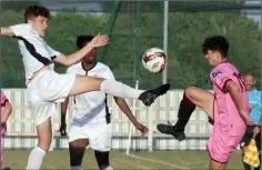  ??  ?? Wexford’s Brody Murphy battles with Reece Murphy.