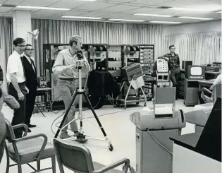  ??  ?? Behind the scenes of “the mother of all demos” was a complete support crew with cameras and mixers – and the computer itself – all 30 miles away at SRI’s offices.