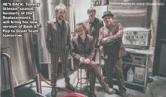  ?? PHOTO BY VINCE DESANTIAGO ?? HE’S BACK: Tommy Stinson, seated, formerly of the Replacemen­ts, will bring his new version of Bash & Pop to Great Scott tomorrow.