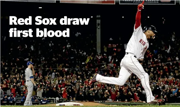  ?? AP ?? Boston Red Sox’s Eduardo Nunez reacts after hitting a three-run home run during the seventh inning of Game 1 of the World Series baseball game against the Los Angeles Dodgers in Boston yesterday.