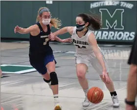  ?? AUSTIN HERTZOG — MEDIANEWS GROUP ?? Methacton’s Nicole Timko tries to drive as Spring-Ford’s Lucy Olsen defends during recent action.