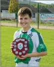  ??  ?? Clara Gaels captain Aaron Conway with the trophy.