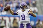  ?? ADAM HUNGER — THE ASSOCIATED PRESS ?? Minnesota Vikings quarterbac­k Kirk Cousins (8) passes against the New York Giants during the first quarter of an NFL football game, Sunday, Oct. 6, in East Rutherford, N.J.