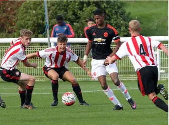  ??  ?? Below Men against boys: Rashford takes charge against Sunderland U18s a few months before making his famous senior bow