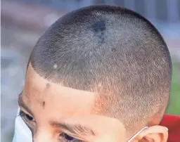  ?? NICK OZA/THE REPUBLIC ?? Angel Rodriguez gets ashes during an Ash Wednesday Mass at St. Matthew’s Catholic Church in Phoenix.