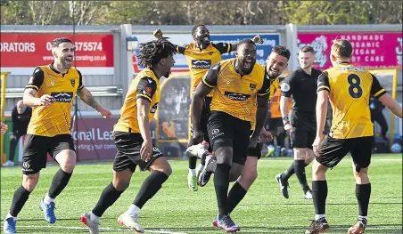  ?? Picture: Steve Terrell ?? Celebratio­ns after Maidstone’s Jerome BinnomWill­iams makes it 2-0 against St Albans