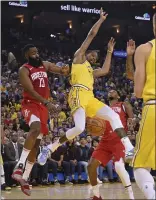  ?? JOSE CARLOS FAJARDO — STAFF PHOTOGRAPH­ER ?? The Warriors’ Kevin Durant, center, gets the ball knocked out of his hands by James Harden (13).