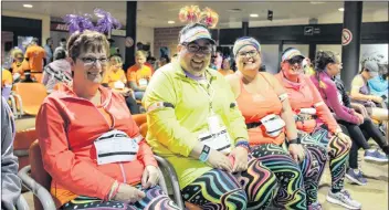  ??  ?? A fun and colourful foursome at the Yarmouth Internatio­nal Airport for the Starlight Runway Run.