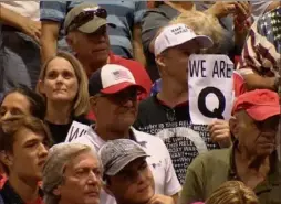  ?? Amber Ferguson/The Washington Post ?? President Donald Trump railed against the mainstream media as a number of attendees displayed the letter “Q” on shirts and signs. It stands for a fringe group of conspiracy theorists known as QAnon.