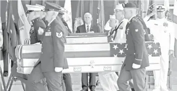  ?? AGENCE FRANCE PRESSE ?? United States Vice President Mike Pence (L) pay respects, as Commander of US Indo-Pacific Command, Admiral Phil Davidson (hidden) and deputy director of the DPAA, rear admiral Jon C. Kreitz (R), salute as a military honor guard carries the remains of...