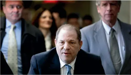  ?? AP ?? Former Hollywood producer Harvey Weinstein arrives at a Manhattan courthouse yesterday in New York. He was found guilty of rape and sexual assault and Judge James Burke ordered he be taken to jail immediatel­y. However, he was taken to Bellevue Hospital.