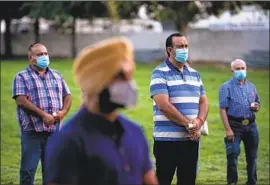  ?? Andrew Kuhn Merced Sun-Star ?? A VIGIL Thursday honored Foster Farms workers affected by COVID-19. A union official said the company has “sought to obscure the number of deaths.”