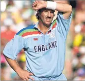  ??  ?? England captain Ian Botham wipes sweat from his brow as he looks dejected during the 1992 World Cup final in Melbourne