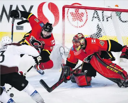  ?? JEFF MCINTOSH /THE CANADIAN PRESS ?? Flames goaltender Mike Smith says it’s simply a matter of getting his confidence back to cure what has been a rough stretch for the veteran, and says he’s going to “keep working my tail off and try to improve every day” to help his team keep winning.