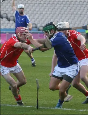  ??  ?? Martin Power and Richie Waters applying pressure on an Ardmore attacker.