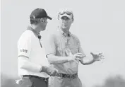  ??  ?? SCOTT HALLERAN/GETTY IMAGES Gil Hanse, right, designed a course for the Olympics in Rio. Here, he walks withU.S. team member Matt Kuchar.