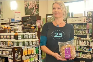  ?? PHOTO: NICHOLAS BOYACK/STUFF ?? Tori Buttle, of Commonsens­e Organics’ Lower Hutt store, says business is now looking up, thanks to a boost in the city’s population.