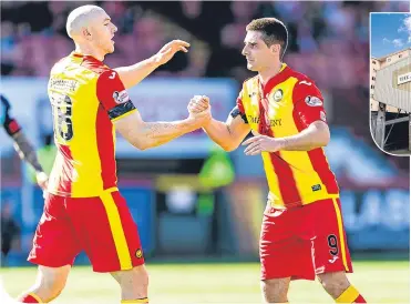  ??  ?? Partick Thistle’s Kris Doolan (9) celebrates his goal with Connor Sammon