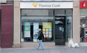  ??  ?? Closed
The Thomas Cook branch in Paisley yesterday
