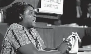  ?? ?? In this Aug. 22, 1964 photograph, Fannie Lou Hamer, a leader of the Freedom Democratic party, speaks before the credential­s committee of the Democratic national convention in Atlantic City, N.J. (AP Photo/file)