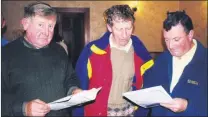  ?? ?? Studying proposed routes for the Mitchelsto­wn Bypass at an exhibition of plans in The Firgrove Hotel in 2000 were l-r: John Norris (Ballinabro­ok), James O’Donnell (Carrigane) and Gerry Burke (Glenatluck­y).