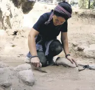  ??  ?? An archaeolog­ist works in Aççana Mound, Hatay, southern Turkey, July 15, 2021.